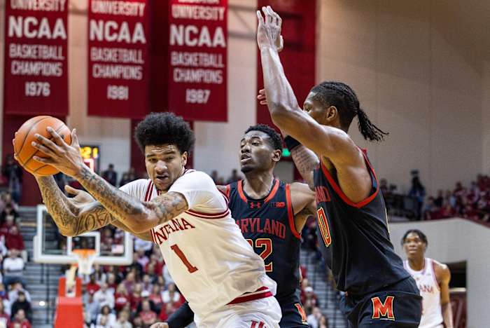 Indiana Hoosiers center Kel'el Ware (1) move to shoot the ball while Maryland Terrapins forward Jordan Geronimo (22) and forward Julian Reese (10) defend in the first half at Simon Skjodt Assembly Hall.